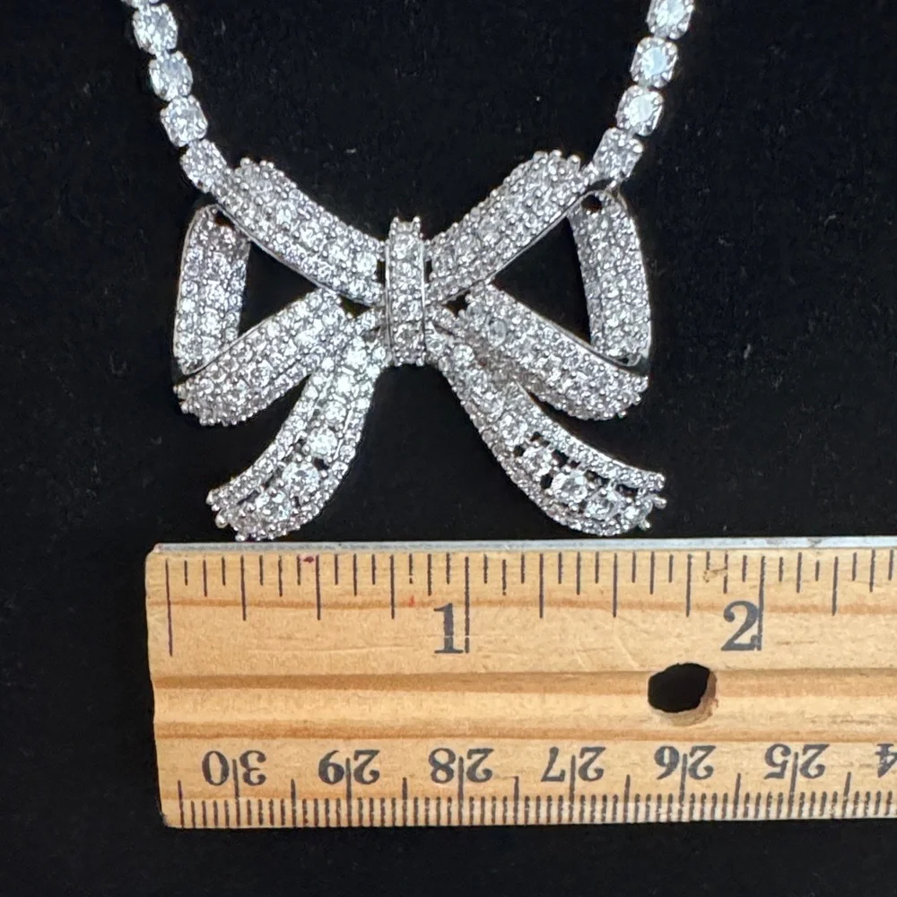 Camila Coelho Elegant Silver color Bow Necklace